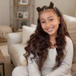 North West age biography image with a casual indoor setting
